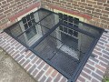Large-Grate-with-flat-tabs-and-hatch-in-black